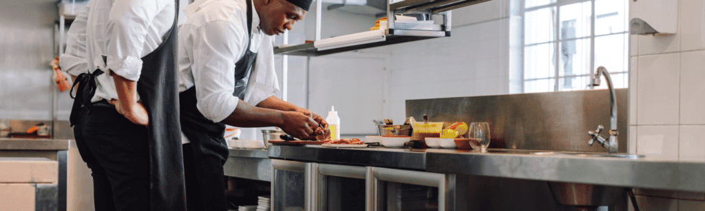 Kitchen in Fort Myers Florida with a checf preparing a meal