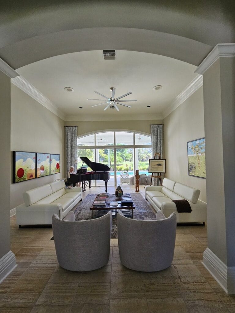 Living room remodel in Bonita Springs with white counches in an open living space