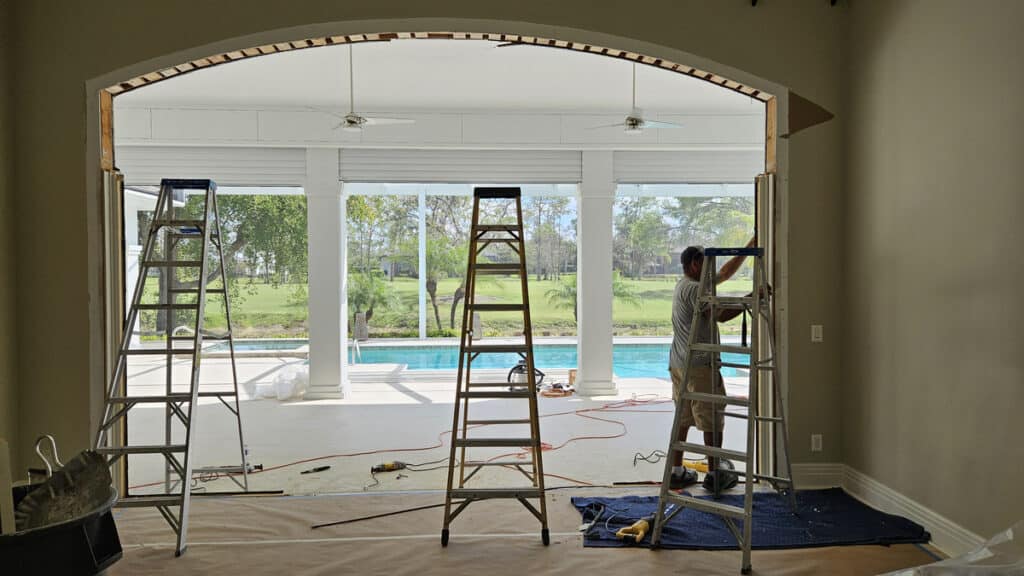 Contractor working on an archway 