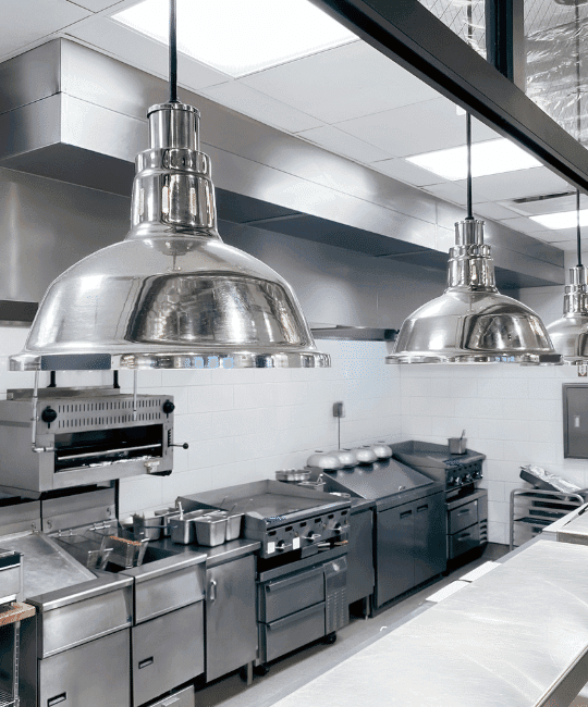 Custom Comercial Kitchen filled with stainless steel equipment